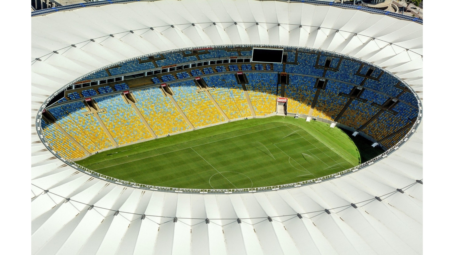 Maracanã Stadium aerial close-up A close-up aerial view of the empty Maracanã Stadium, highlighting its vast, vacant stands.